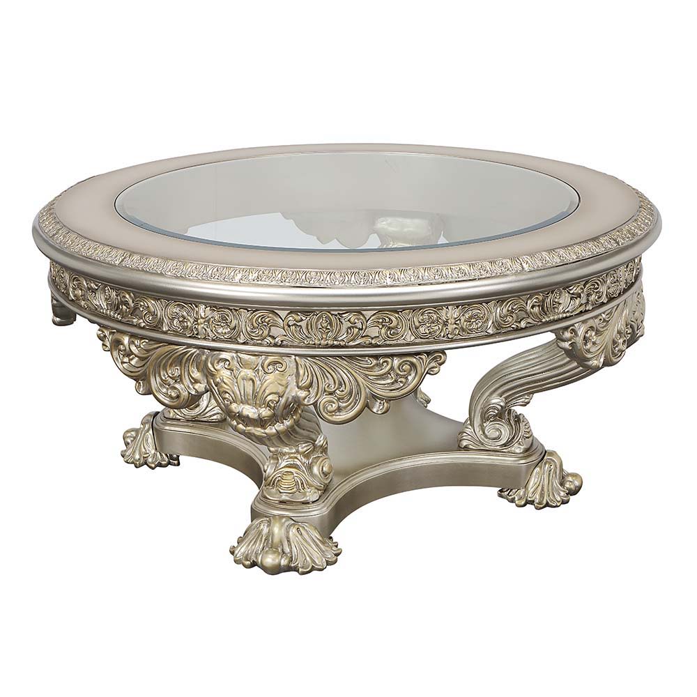 Lavish and grand, the Danae coffee table offers the right amount of wow factor that your living space needs to create a classy home. The antique white and gold finish enhances the ornate carvings on the base and apron of the table. Display books and decor