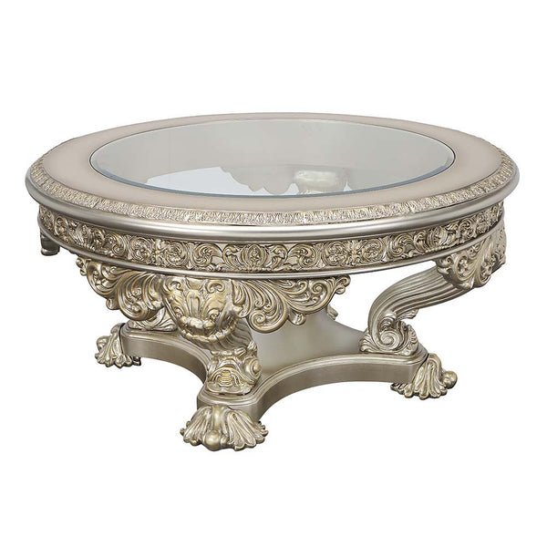 Lavish and grand, the Danae coffee table offers the right amount of wow factor that your living space needs to create a classy home. The antique white and gold finish enhances the ornate carvings on the base and apron of the table. Display books and decor