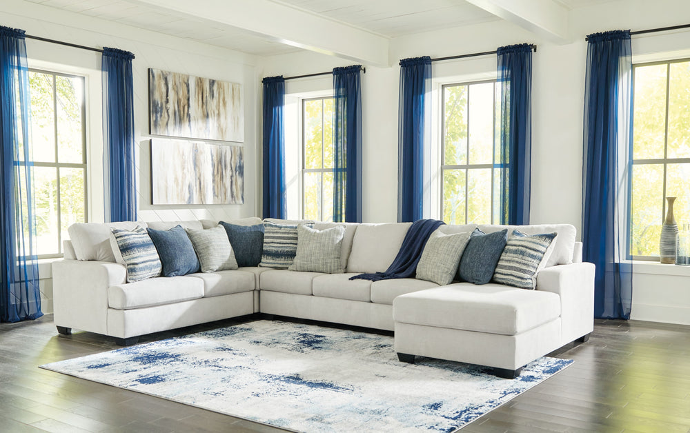 What a pleasant surprise: high-end luxury made comfortably affordable. Thatâ€™s what makes this sectional and ottoman in stone gray so alluring. Made exclusively for those wanting to make a designer statement, this finely crafted sectional is dressed to i