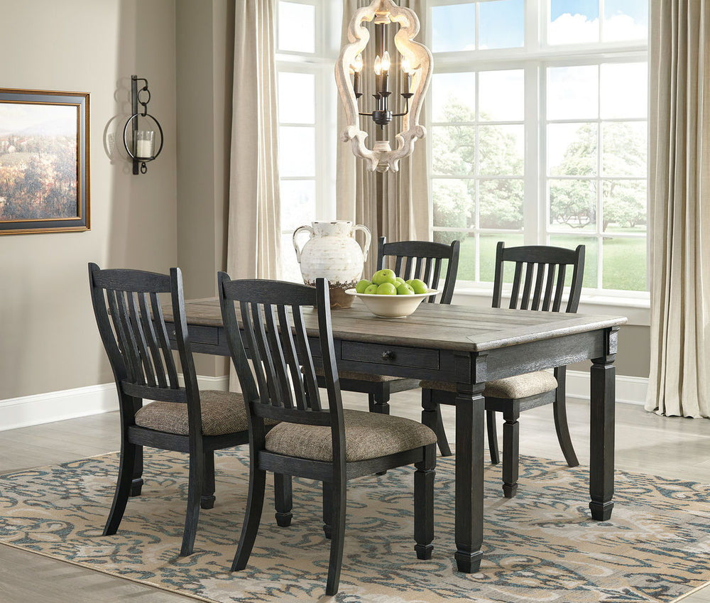 Unique two-tone finish with a combination of Oak and Acacia substrates combining a trendy textured antique black color with table and server tops finished in a textural weathered oak finish. Rectangular dining table features six convenient drawers for sto