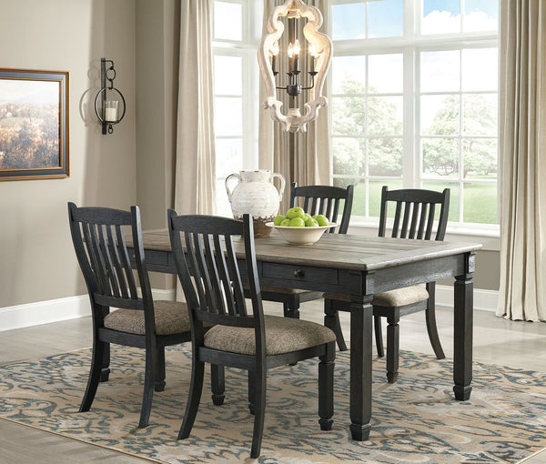 Unique two-tone finish with a combination of Oak and Acacia substrates combining a trendy textured antique black color with table and server tops finished in a textural weathered oak finish. Rectangular dining table features six convenient drawers for sto