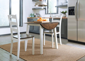 Made with Birch veneers and select hardwood solids in a distinctive two-tone cottage finish. Cream table base and chair frame with medium brown color table tops and chair seats. Updated cottage styling, table has arched aprons and chair has pierced ladder