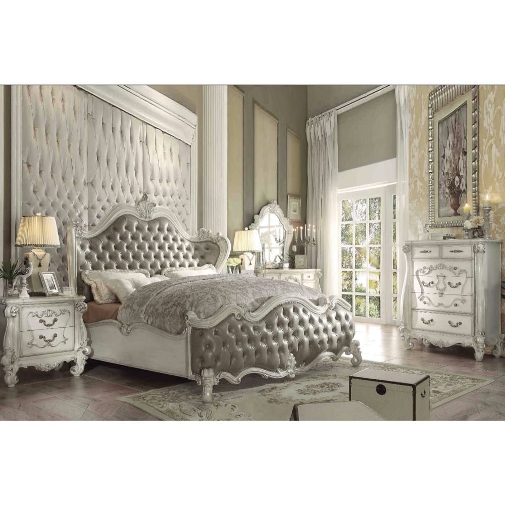 Sleep like royalty with this Versailles Bed Set. The bedroom set was inspired by old European design. The bed features carved scrollwork accent with nailhead trim Decor and tufted upholstery on both headboard and footboard. The accent pieces crafted in wo