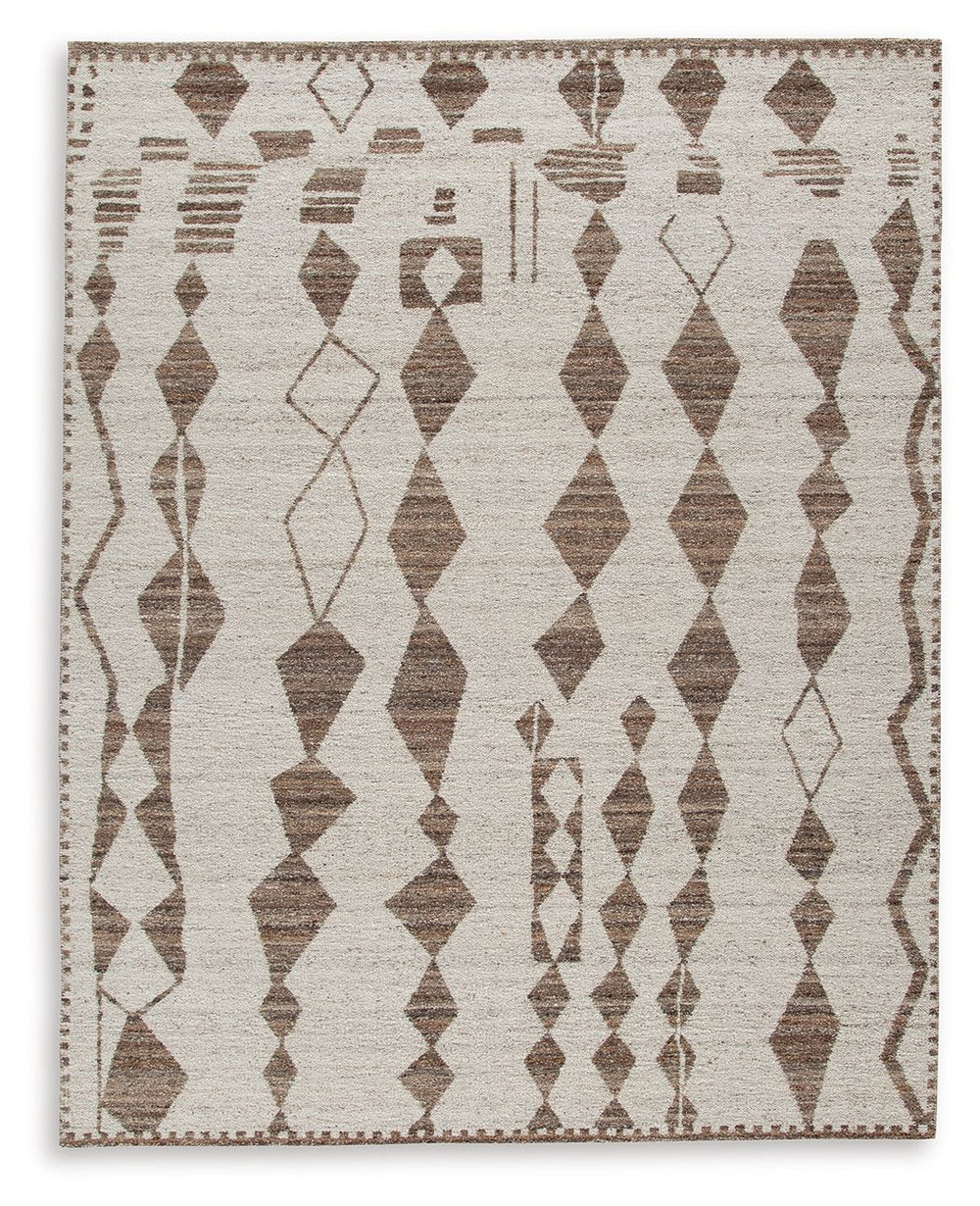 With its striking geometric design, this area rug knows how to make a subtle statement. Its shades of beige and brown are a welcome complement underfoot that doesnâ€™t overtake your roomâ€™s decor. This beautiful rug infuses a laid-back sensibility that s