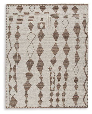 With its striking geometric design, this area rug knows how to make a subtle statement. Its shades of beige and brown are a welcome complement underfoot that doesnâ€™t overtake your roomâ€™s decor. This beautiful rug infuses a laid-back sensibility that s