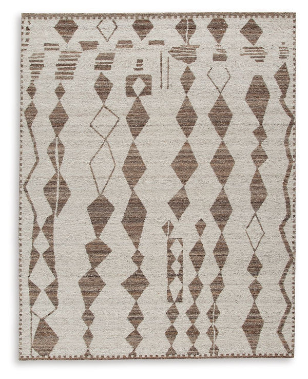 With its striking geometric design, this area rug knows how to make a subtle statement. Its shades of beige and brown are a welcome complement underfoot that doesnâ€™t overtake your roomâ€™s decor. This beautiful rug infuses a laid-back sensibility that s