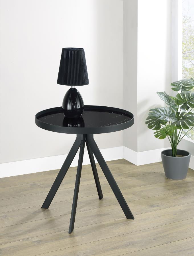 This modern round end table combines durability and elegance with its tempered glass top featuring a marble-patterned print. Supported by a sturdy four-legged metal frame, its minimalist design adds sophistication to any room. Perfect for use as an accent