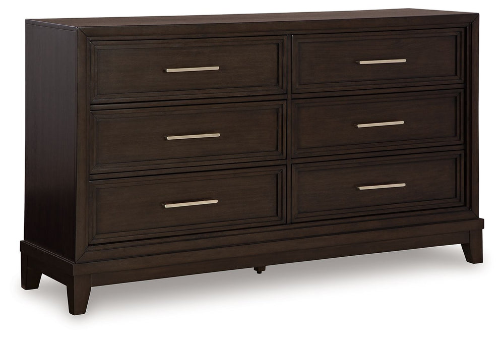This dresser combines modern and art deco styles for both traditional and contemporary arrangements. With elegant stepped moulded framing and ample storage, it adds dimension to your sanctuary while keeping your belongings organized and clutter-free. Indu