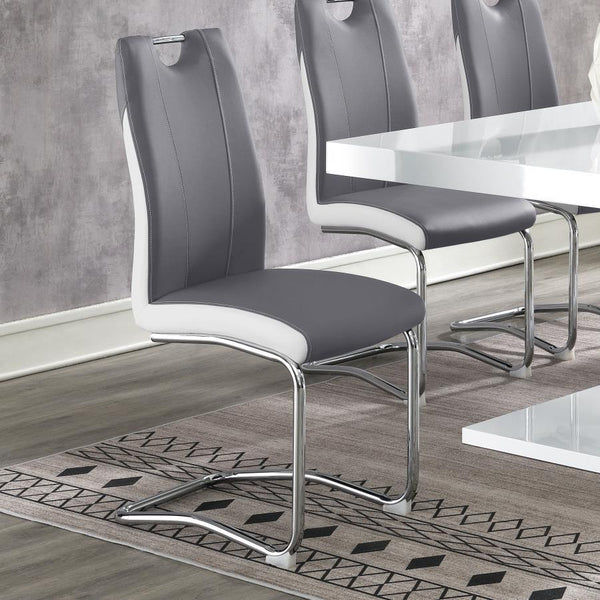  this side chair features a modern cantilever design with a two-tone faux leather finish. Upholstered in soft grey with crisp white accents