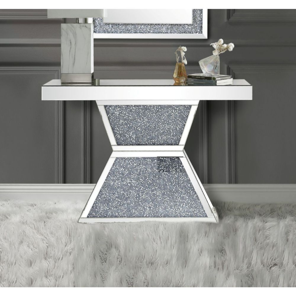 KD, Rectangular Console Table NO Storage Features: Mirrored Top, Mirrored Pedestal Base w/Faux Diamonds & Clear Glass CONSTRUCTION Mirrored Top (NO Apron): 4mm Beveled Mirror, MDF Mirrored Geometric Pedestal Base: 4mm Beveled Mirror, MDF, Faux Diamonds In