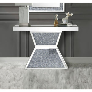KD, Rectangular Console Table NO Storage Features: Mirrored Top, Mirrored Pedestal Base w/Faux Diamonds & Clear Glass CONSTRUCTION Mirrored Top (NO Apron): 4mm Beveled Mirror, MDF Mirrored Geometric Pedestal Base: 4mm Beveled Mirror, MDF, Faux Diamonds In