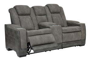 Sleek, ultra-modern power reclining loveseat. Two-tone Durapella upholstery is more durable and water-repellent than regular leather. Includes wireless and USB charging, adjustable headrest and extended -"zero-gravity-" ottoman.<br><br><b>Additional Dimen