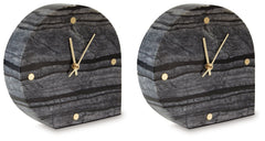 This table clock is a contemporary take on classic function. Made with black marble, it brings an elevated feel to tabletops and decorative displays. Staying on time has never been so stylish.<br/><br/><b>Product Features</b><ul><li>Made with black marble