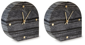 This table clock is a contemporary take on classic function. Made with black marble, it brings an elevated feel to tabletops and decorative displays. Staying on time has never been so stylish.<br/><br/><b>Product Features</b><ul><li>Made with black marble