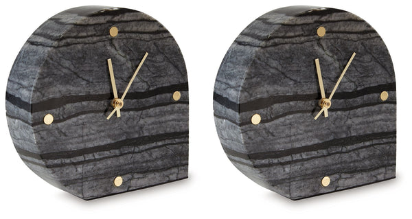 This table clock is a contemporary take on classic function. Made with black marble, it brings an elevated feel to tabletops and decorative displays. Staying on time has never been so stylish.<br/><br/><b>Product Features</b><ul><li>Made with black marble