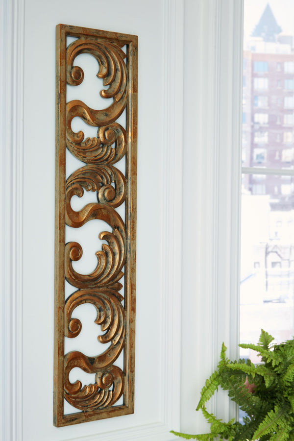  expensive feel without breaking the bank. This wall sculpture-'s stately scrollwork design is dressed in an antiqued goldtone finish. Hang it in your entryway to set a tasteful tone