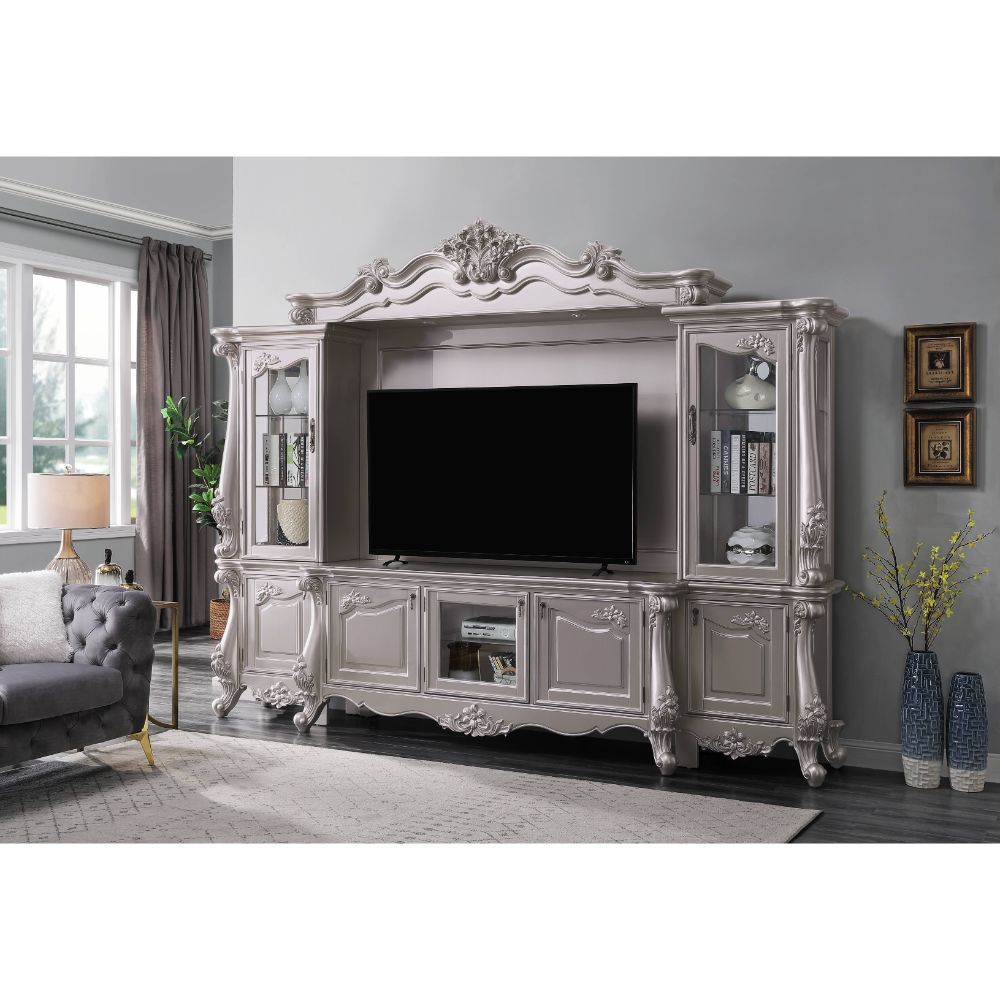 The Bently entertainment center is the perfect centerpiece for your media room. Gorgeous carved floral motifs and over-sized Queen Anne legs grace each part of this set. The TV stand easily accommodates a 70-inch panel TV. Coupled with the side piers, you