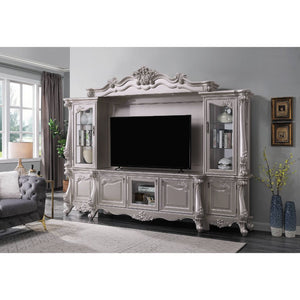The Bently entertainment center is the perfect centerpiece for your media room. Gorgeous carved floral motifs and over-sized Queen Anne legs grace each part of this set. The TV stand easily accommodates a 70-inch panel TV. Coupled with the side piers, you