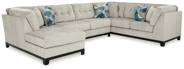 Fresh, on-trend style meets functionality in this sectional with chaise. Details like tufted cushions and a wrap-around accent base reflect your urban contemporary tastes while staying versatile as your style changes. And with its soft upholstery, your co