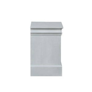  the simple moldings and luxurious pull handles add subtle sty