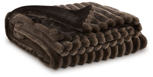 As cozy as they come, this faux fur throw turns your seating area into a haven of comfort. Its neutral hue acts as the perfect foundation for layering, whether mixed with pillows or draped over the arm of a sofa. And itâ€™s machine washable, so you can sp