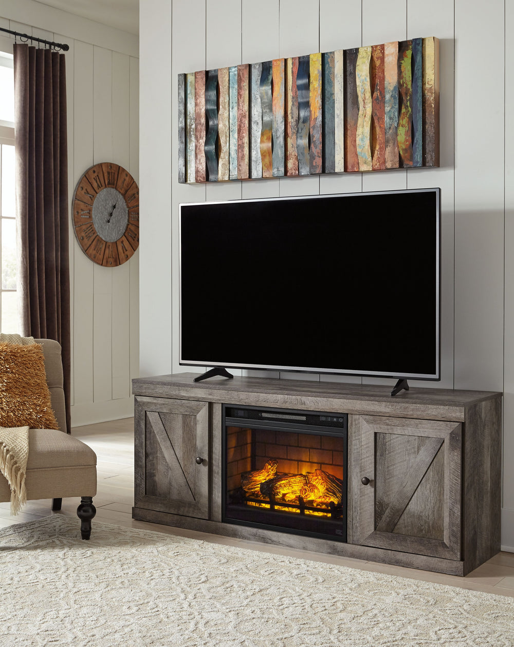 This TV stand with LED fireplace insert is sure to win your heart with its daring designer take on country living. Its crisp, clean and minimalist-chic profile is enriched with a gray finish, striking replicated oak grain and thick plank styling for that 