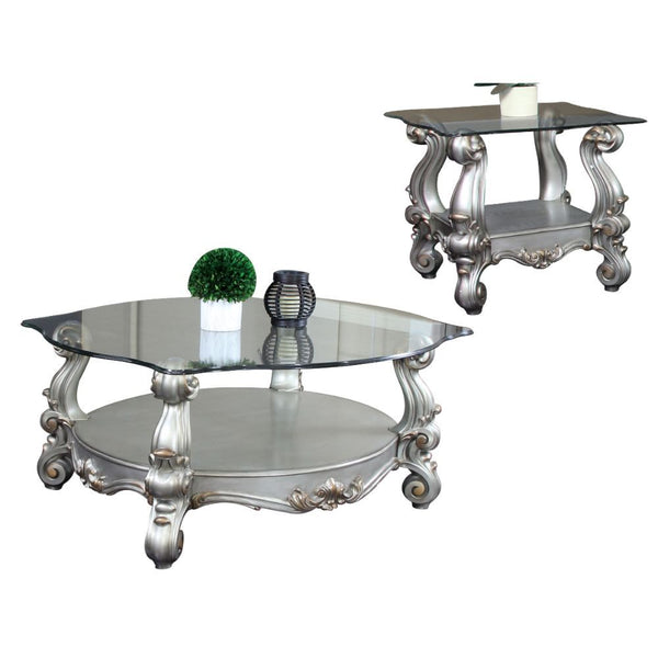  Coffee Table w/Curved Glass Top â€¢ Open Compartment: Bottom Shelf â€¢ 12mm Clear Tempered Glass w/Beveled â€¢ Oversized Scrolled Legs & Shelf Apron: Poly Resin with Antique Contrast Finish<br/><br/><b>Product Features</b><ul><li>Exclusive Design</li>