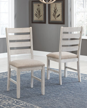  this comfortably cushioned chair sports a grayish white finish with rub through effect for timeworn appeal.<br><br><b>