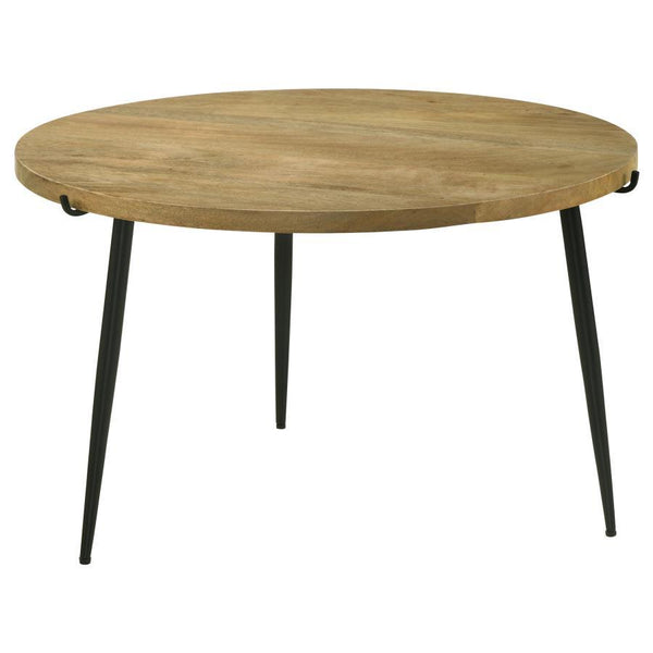Effortlessly blending retro charm with modern design, this round coffee table features a solid mango wood top in a natural finish, highlighting organic grains and patterns. Supported by sturdy, black powder-coated iron legs, the minimalist design offers d