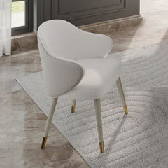 Elevate your dining experience with the Charity dining set. Featuring a sleek marble tabletop and a gray oak finish, this set exudes modern elegance. The sturdy base and stylish chairs create a harmonious blend of comfort and sophistication. Perfect for i