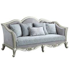 With a timeless silhouette influenced by French beauty, this Qunsia sofa makes a gracious statement in a comforting light gray linen upholstery fabric. Delicate curves invite the eye, while cabriole legs the champagne wooden trim that adds visual impact. 
