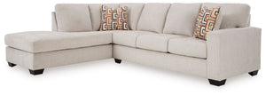 Looking to make a simply chic statement with color? Liven up your living room with this sectional with chaise. Styled with trend-right light neutral upholstery, itâ€™s a blank canvas perfect for adding pops of color to your decor. Bold and eclectic accent