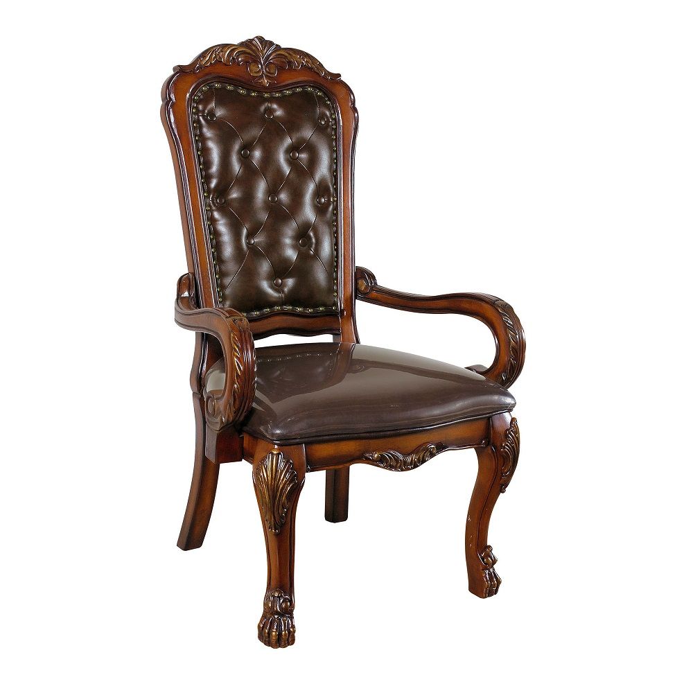 The Dresden executive arm chair classic style will blend masterfully in your home. Carefully constructed from faux leather selected wood and veneers in rich Cherry Oak Finish. Highly decorative details, button tufted backrest, claw feet and decorative Nai