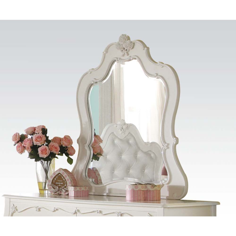 Create the dream bedroom for your little girl with Edalene collection. Beautiful accents are seen throughout including clear rosette knobs and tapered legs. The bed features a pearl white tufted headboard. With many storage options and details like floral