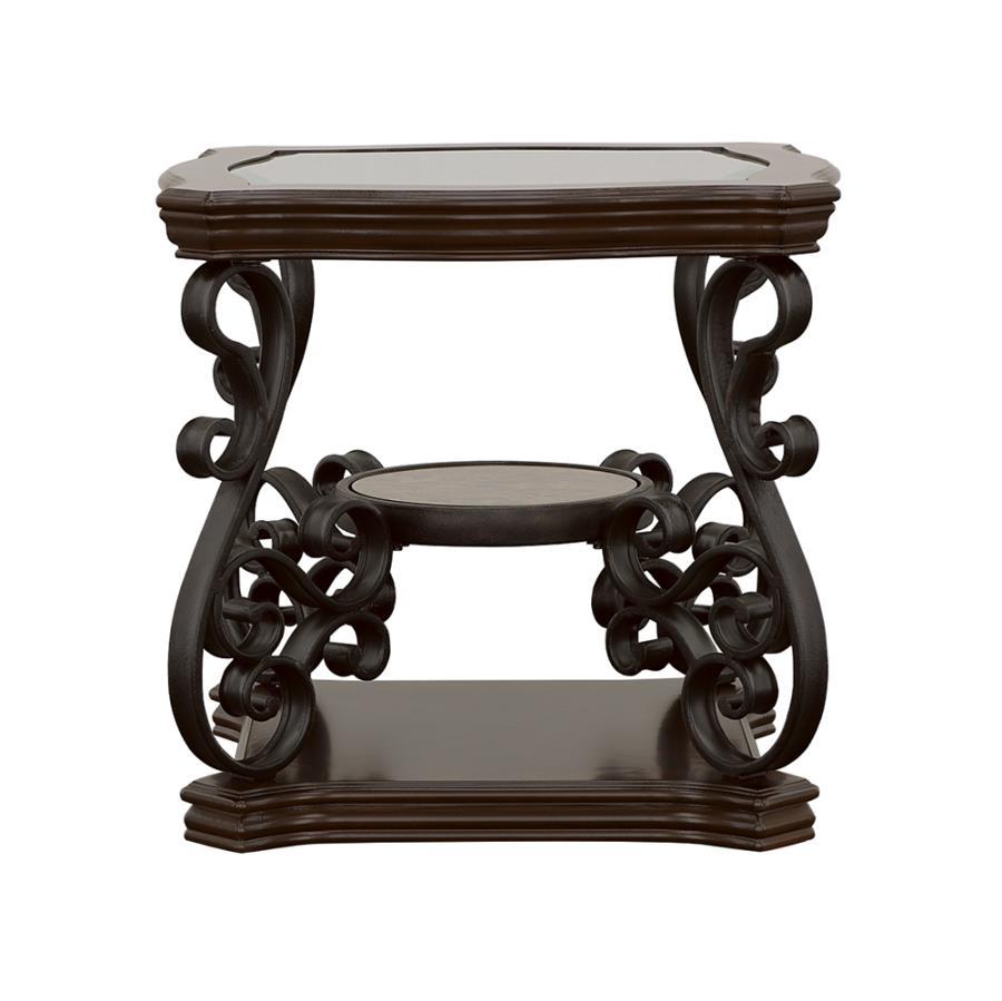 This elegant end table brings a blend of classic style and practicality to any living space. The clear tempered glass top offers a durable and polished surface, complemented by ornate scrollwork on the dark bronze powder-coated metal legs. The dark merlot