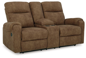 This reclining loveseat with console is your best shot for comfort and total relaxation. Its super soft faux leather, contemporary bustle back and contrast stitching team up for a big win with most any color scheme and room decor. With the pull tab reclin