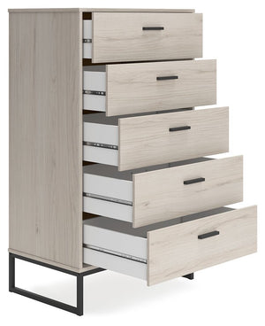  this chest of drawers is inspired by chic design. A light natural finish over replicated oak grain offers an authentic touch to this so-cool piece. It beautifully blends the hues of natural living with the edginess of your modern lifesty