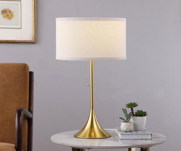  it features a pedestal base with a gold finish that offers timeless