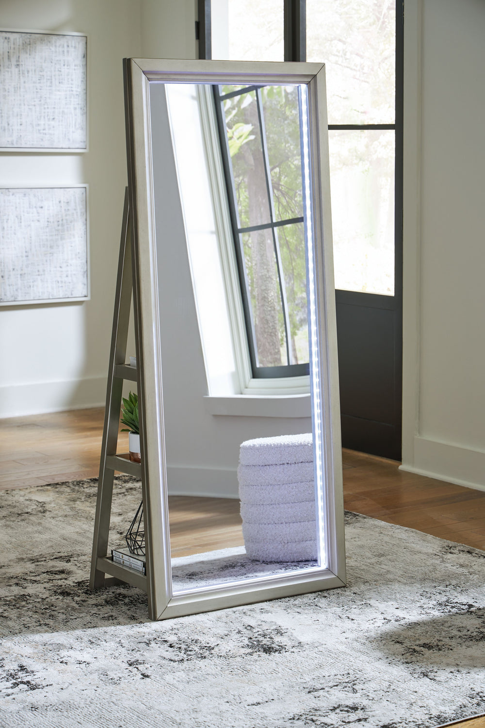 This floor mirror with storage makes on-the-go glam effortless. Complete outfits with accessories in an instantâ€”thanks to easy-to-access shelving on the back, you can keep all your favorites on hand. And sleek LED lighting around the frame makes last-mi