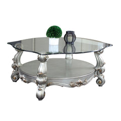KD, Coffee Table w/Curved Glass Top â€¢ Open Compartment: Bottom Shelf â€¢ 12mm Clear Tempered Glass w/Beveled â€¢ Oversized Scrolled Legs & Shelf Apron: Poly Resin with Antique Contrast Finish<br/><br/><b>Product Features</b><ul><li>Exclusive Design</li>