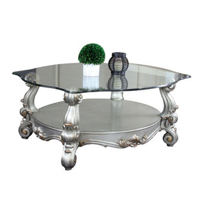 KD, Coffee Table w/Curved Glass Top â€¢ Open Compartment: Bottom Shelf â€¢ 12mm Clear Tempered Glass w/Beveled â€¢ Oversized Scrolled Legs & Shelf Apron: Poly Resin with Antique Contrast Finish<br/><br/><b>Product Features</b><ul><li>Exclusive Design</li>