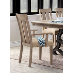 Make your dining room the centerpiece of your home with the Nathaniel dining set. This unique extendable table features a maple wood table top that sits atop an elegant, trestle base. Paring the side and arm chairs with upholstered cushions and nail-head 