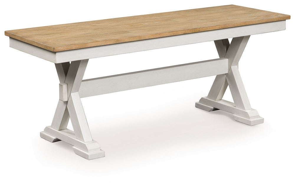 Busy breakfasts and family dinners get a dose of modern farmhouse flair with this dining bench. Its two-tone finish contrasts a light butcher block hue with antiqued white for an utterly charming effect. An effortless seating solution, the bench can tuck 