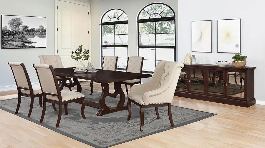 A decorative base is the highlight of this stylish transitional wood dining table. Featuring a rectangular silhouette measuring just over 104 inches, the table easily accommodates eight for everything from a quick breakfast to a holiday feast. Intriguing 