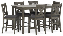 Perfect portion. Striking a simply chic pose, this counter height dining set is crafted with fascinating flair. A subtle gray wash finish gives the clean-lined design a casually cool sensibility. Plushly cushioned seats in a soft, neutral upholstery add t