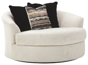 Let it snow. Doubling your pleasure with a spacious seating area with room for twoâ€”or just youâ€”this oversized round swivel chair in a snow-tone neutral invites you to stretch your style in an easy-elegant way. Whether your aesthetic is urban hip or su