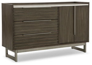 Clean lines lend sophistication and structure to this dresser. Its complex rich grayish brown finish contrasts perfectly with a white marble top, while the streamlined silhouette features overlay slats to create visual interest. A metal base and bar pulls