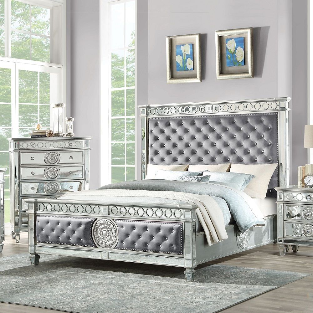 3 Slats - Box Spring Required Panel Bed: Mirrored Raised Geometric Trim & Sunburst Motifs Padded HB/FB: Crystal like Button Tufted Blue Velvet (Solid Pattern) Rectangular HB Low Profile Rectangular FB Mirrored Tapered Leg CONSTRUCTION Wood: Mirror Inlay P