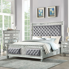 3 Slats - Box Spring Required Panel Bed: Mirrored Raised Geometric Trim & Sunburst Motifs Padded HB/FB: Crystal like Button Tufted Blue Velvet (Solid Pattern) Rectangular HB Low Profile Rectangular FB Mirrored Tapered Leg CONSTRUCTION Wood: Mirror Inlay P