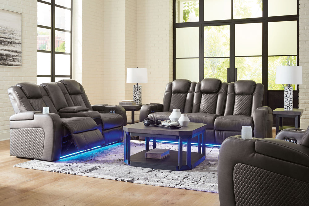 This power reclining living room set goes beyond basic comfort. It upgrades the everyday, turning your living room into an entertainment hub. Donâ€™t want to leave your seat? Keep essentials in reach with assorted charging options, cup holders and storage